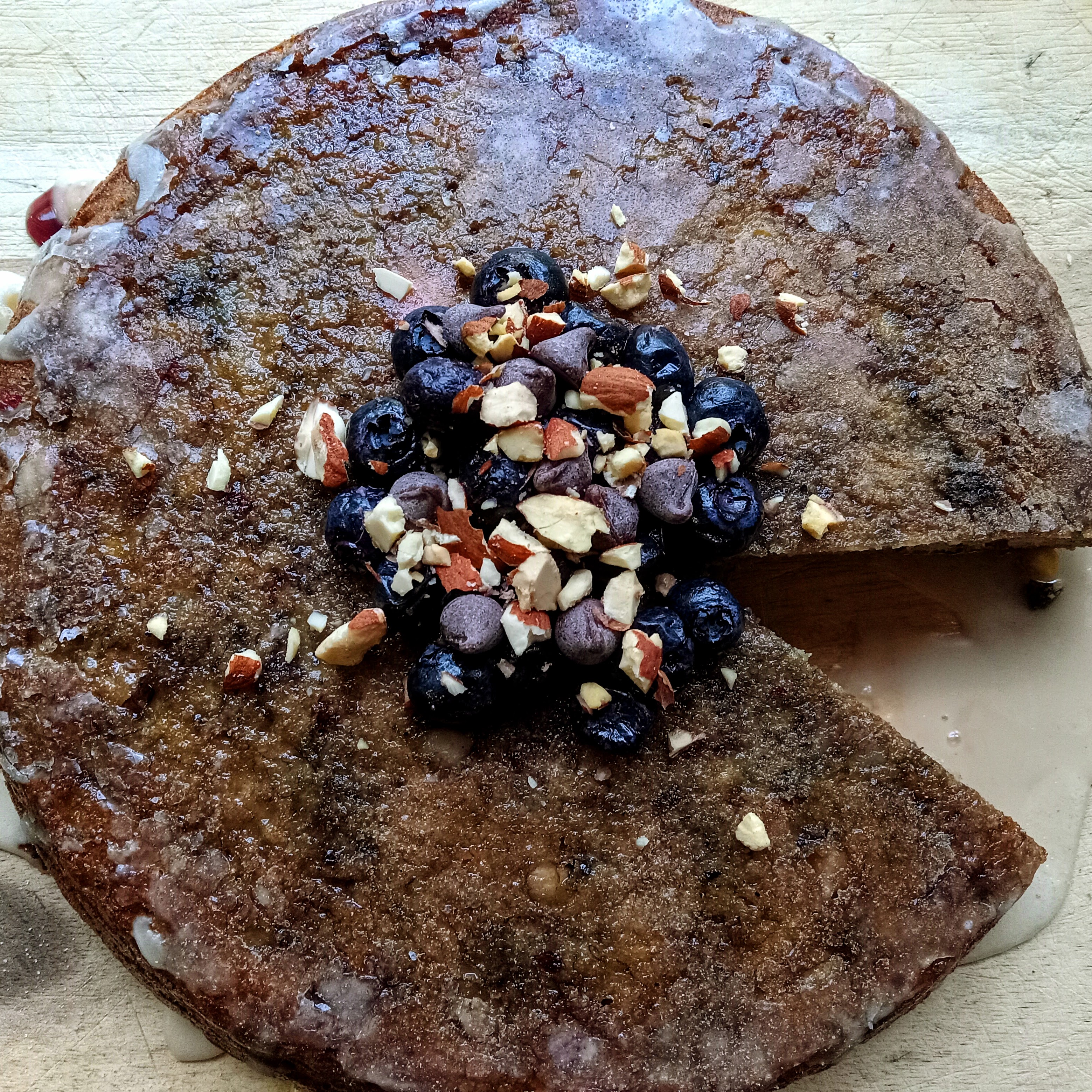 A slice of banana coffee almond cake on a plate.