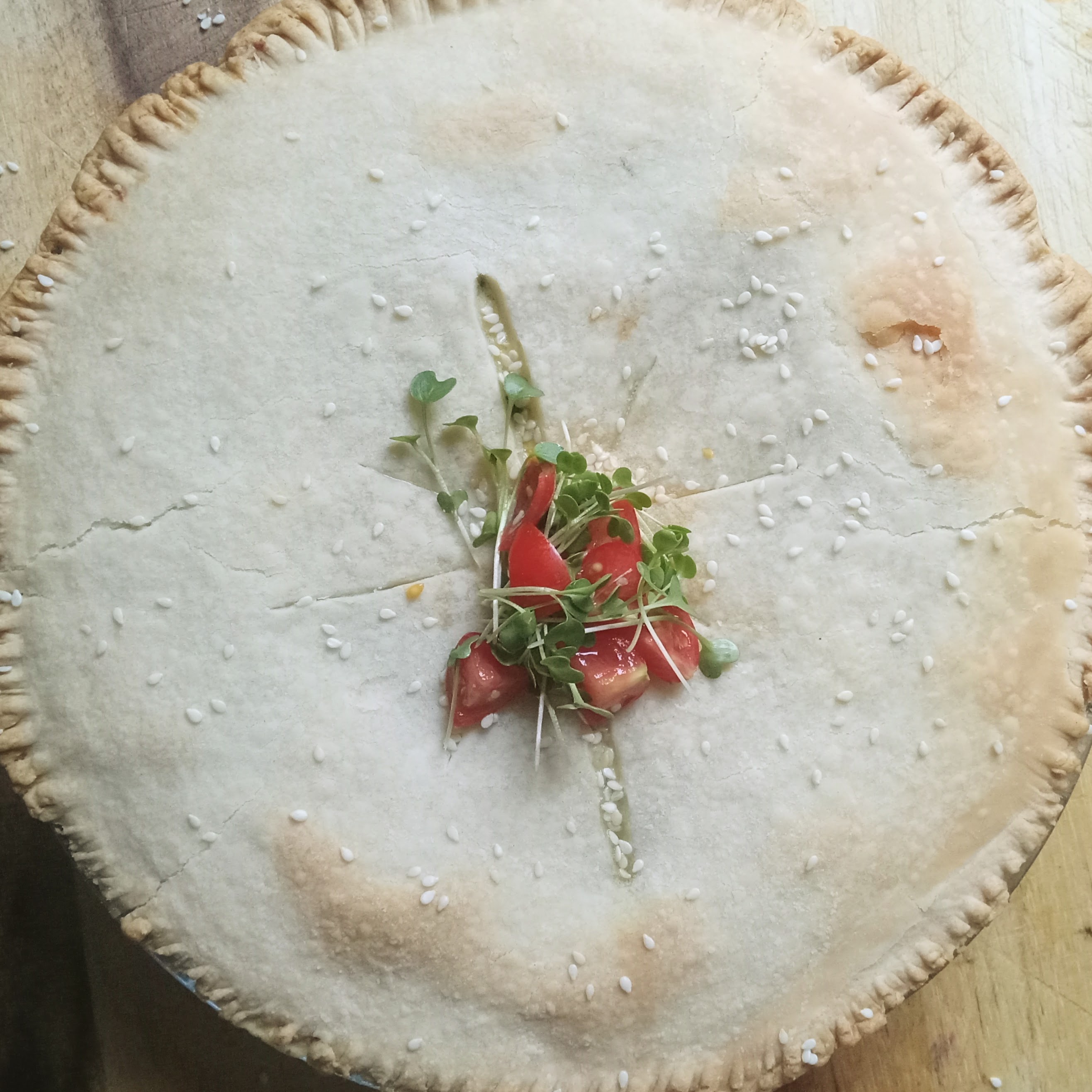A slice of kale and spinach pie on a plate.